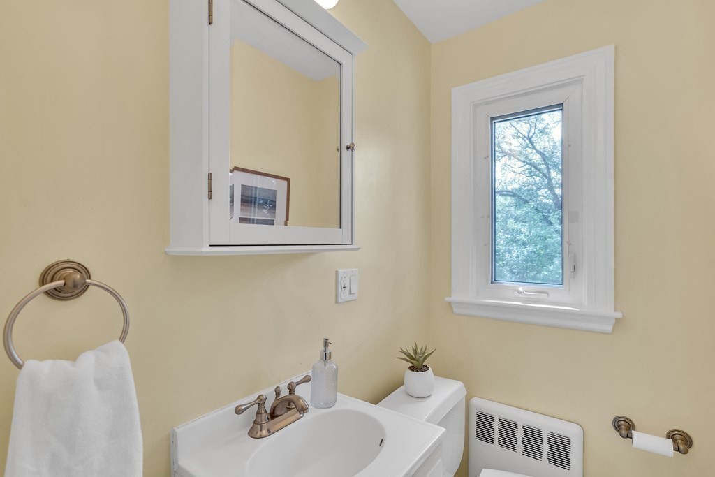 31 Park Drive Newton, MA 02461 - Photo 22 of 31 a bathroom with a sink and a mirror