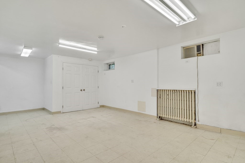 31 Park Drive Newton, MA 02461 - Photo 23 of 31 a view of an empty room with a window