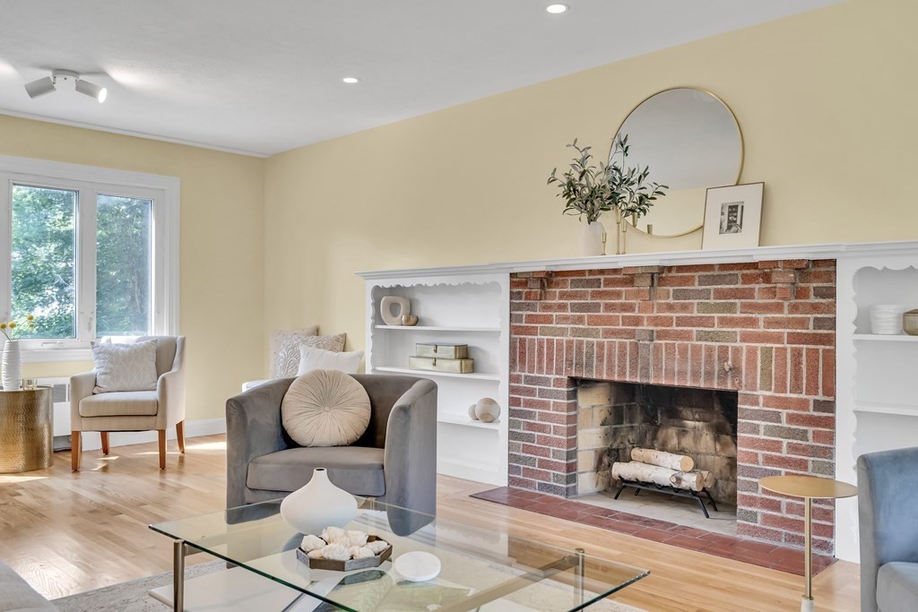 31 Park Drive Newton, MA 02461 - Photo 3 of 31 a living room with furniture and a fireplace