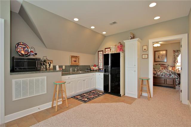 367 Burnt House Road Lebanon, TN 37090 - Photo 15 of 20 a kitchen with a refrigerator and a stove top oven