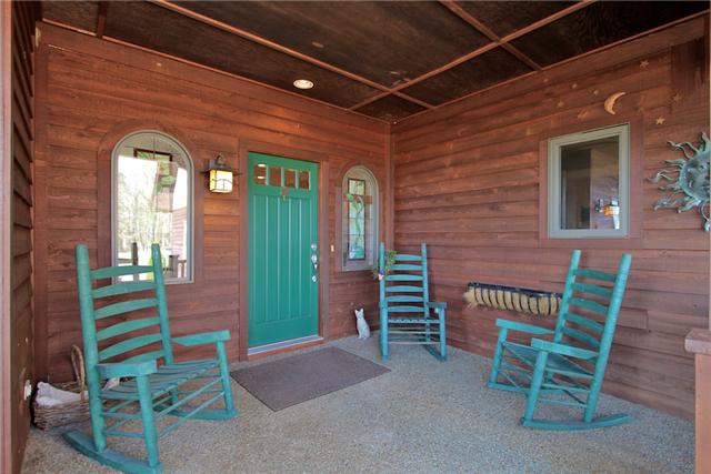 367 Burnt House Road Lebanon, TN 37090 - Photo 3 of 20 a porch with a table and chairs and a barbeque