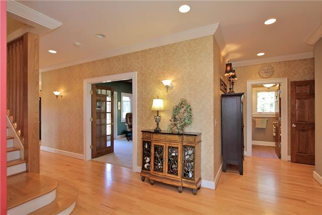 367 Burnt House Road Lebanon, TN 37090 - Photo 4 of 20 a view of a hallway with wooden floor windows and livingroom