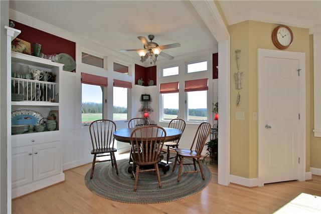 367 Burnt House Road Lebanon, TN 37090 - Photo 8 of 20 a view of a dining room with furniture a chandelier and wooden floor