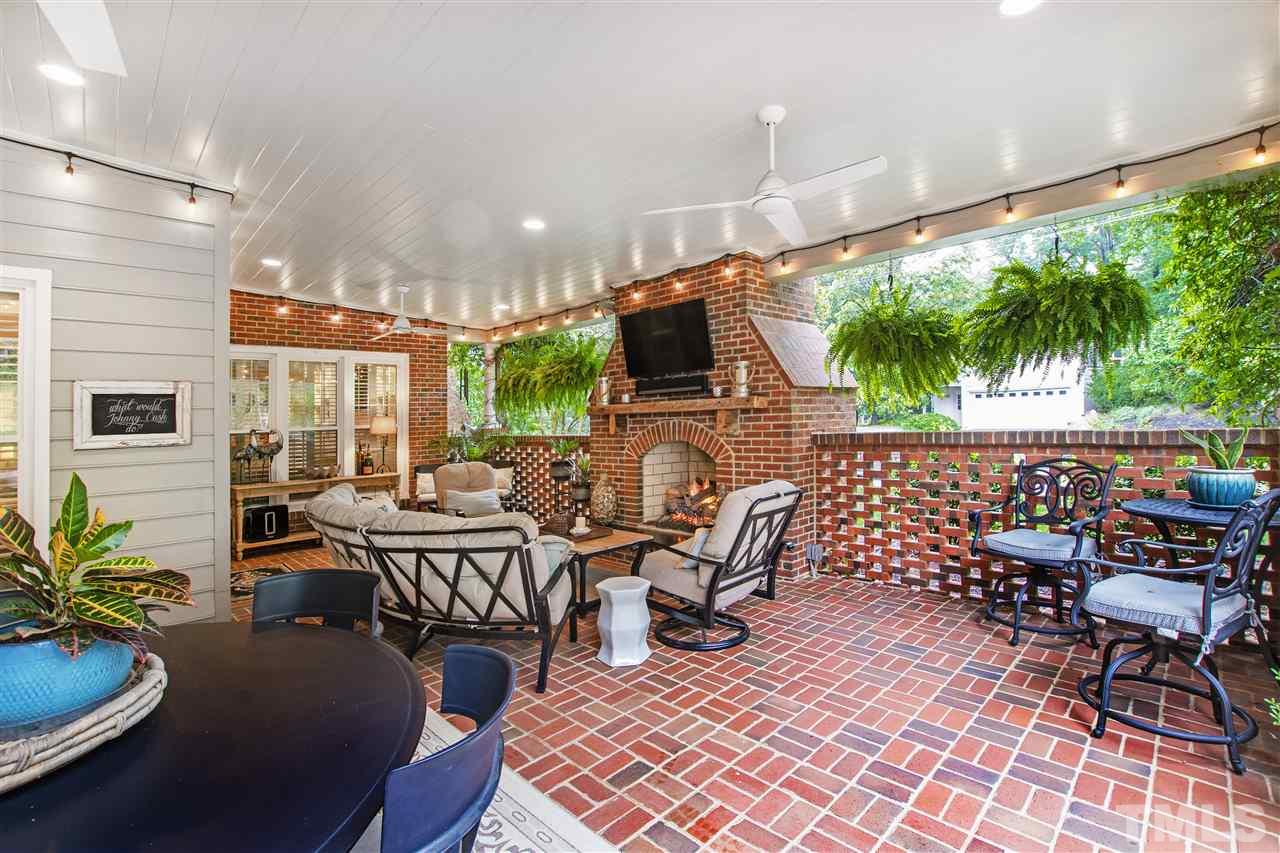2324 Oxford Road Raleigh, NC 27608 - Photo 14 of 30 a outdoor space with lots of tables a garden and chairs