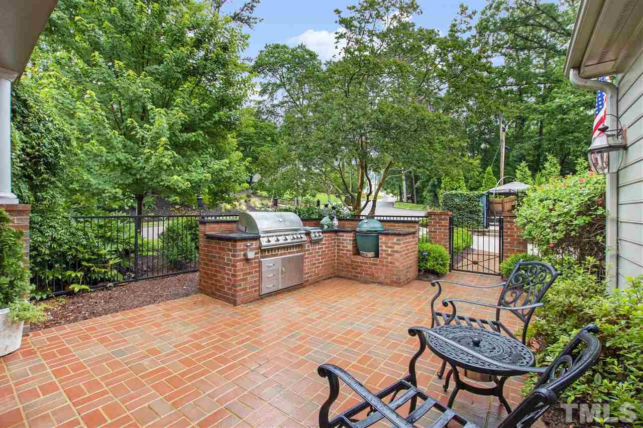 2324 Oxford Road Raleigh, NC 27608 - Photo 16 of 30 a view of a backyard with sitting area