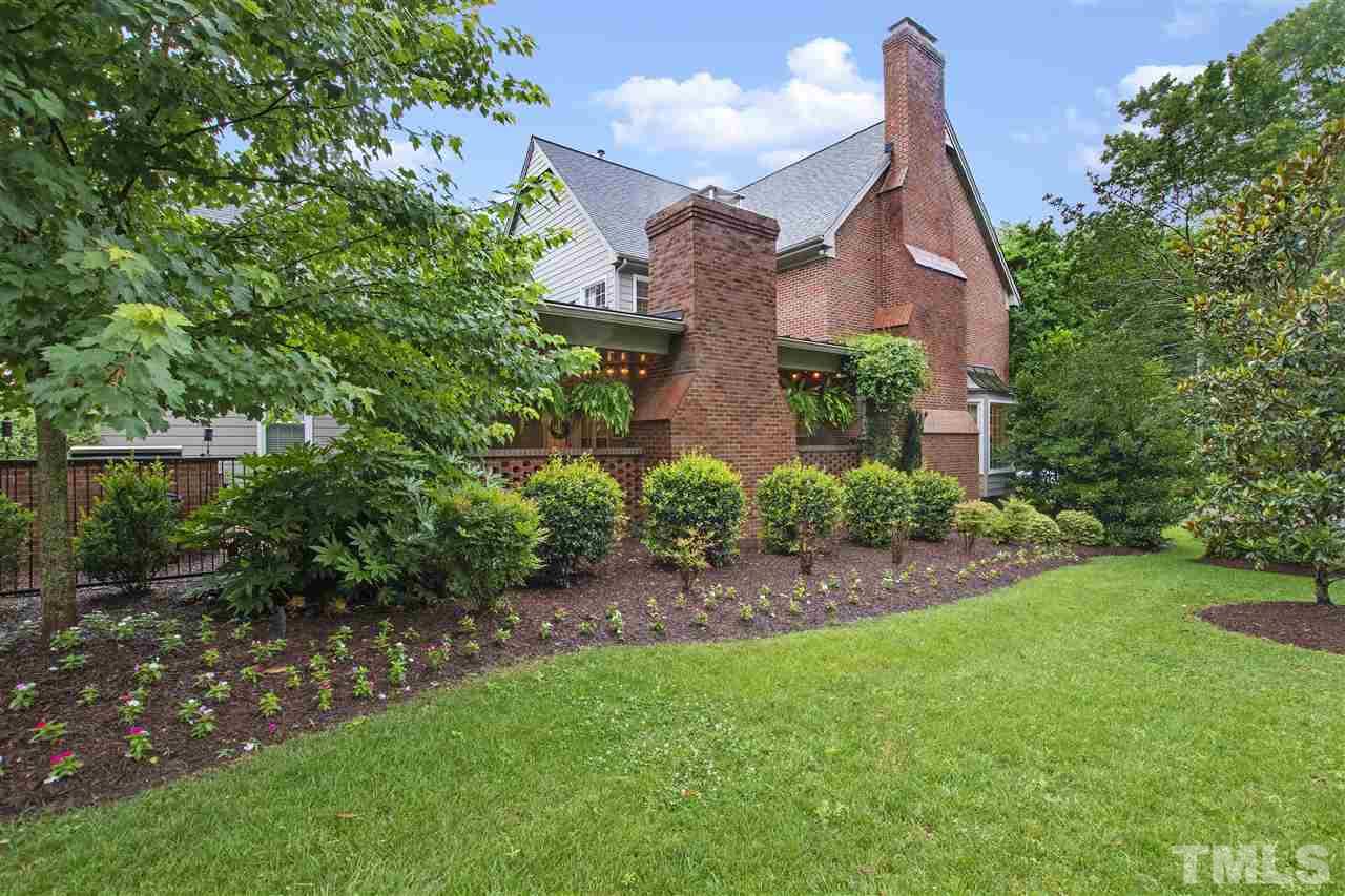 2324 Oxford Road Raleigh, NC 27608 - Photo 19 of 30 a front view of a house with garden