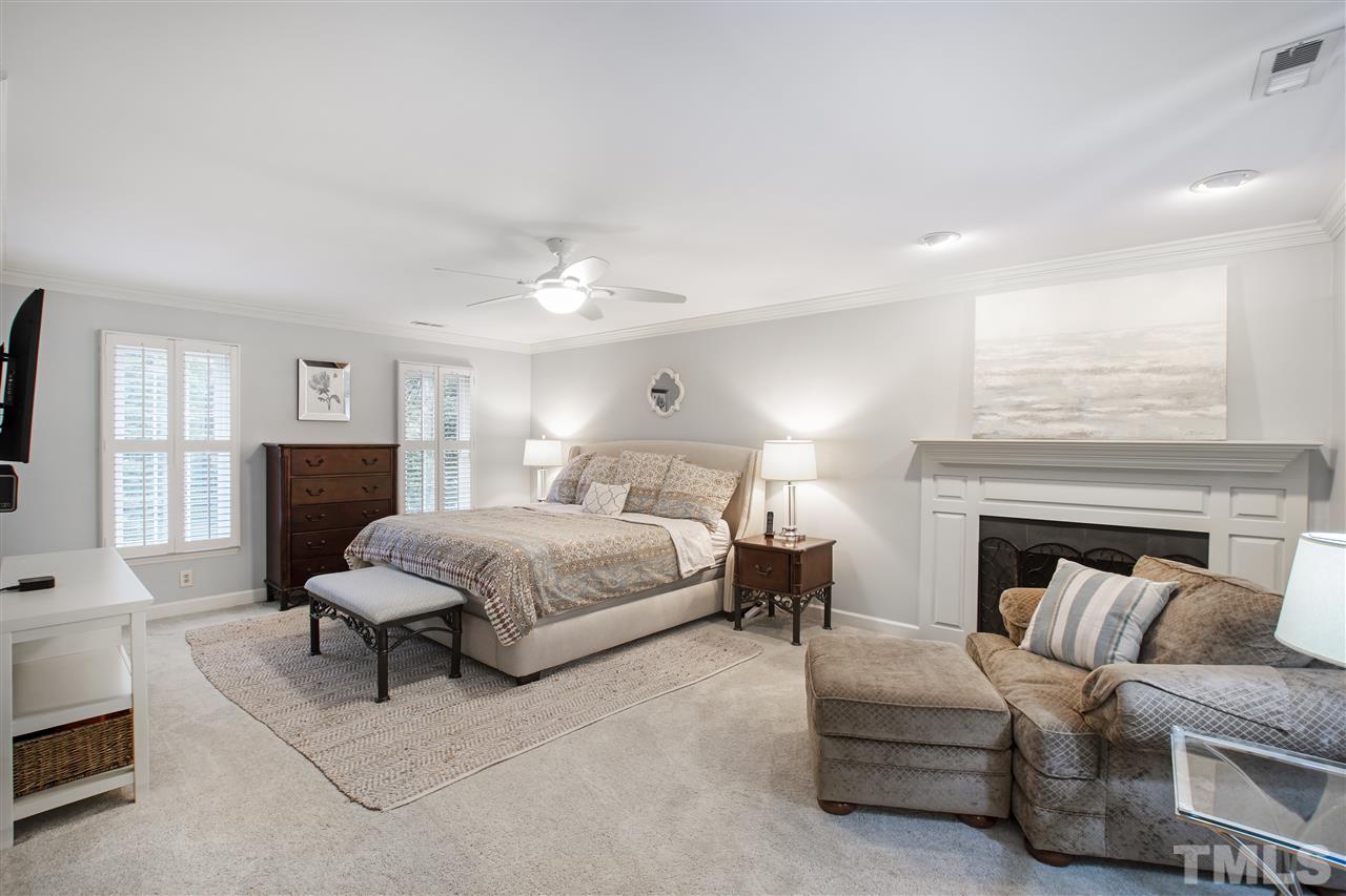 2324 Oxford Road Raleigh, NC 27608 - Photo 20 of 30 a bedroom with a bed and a couch
