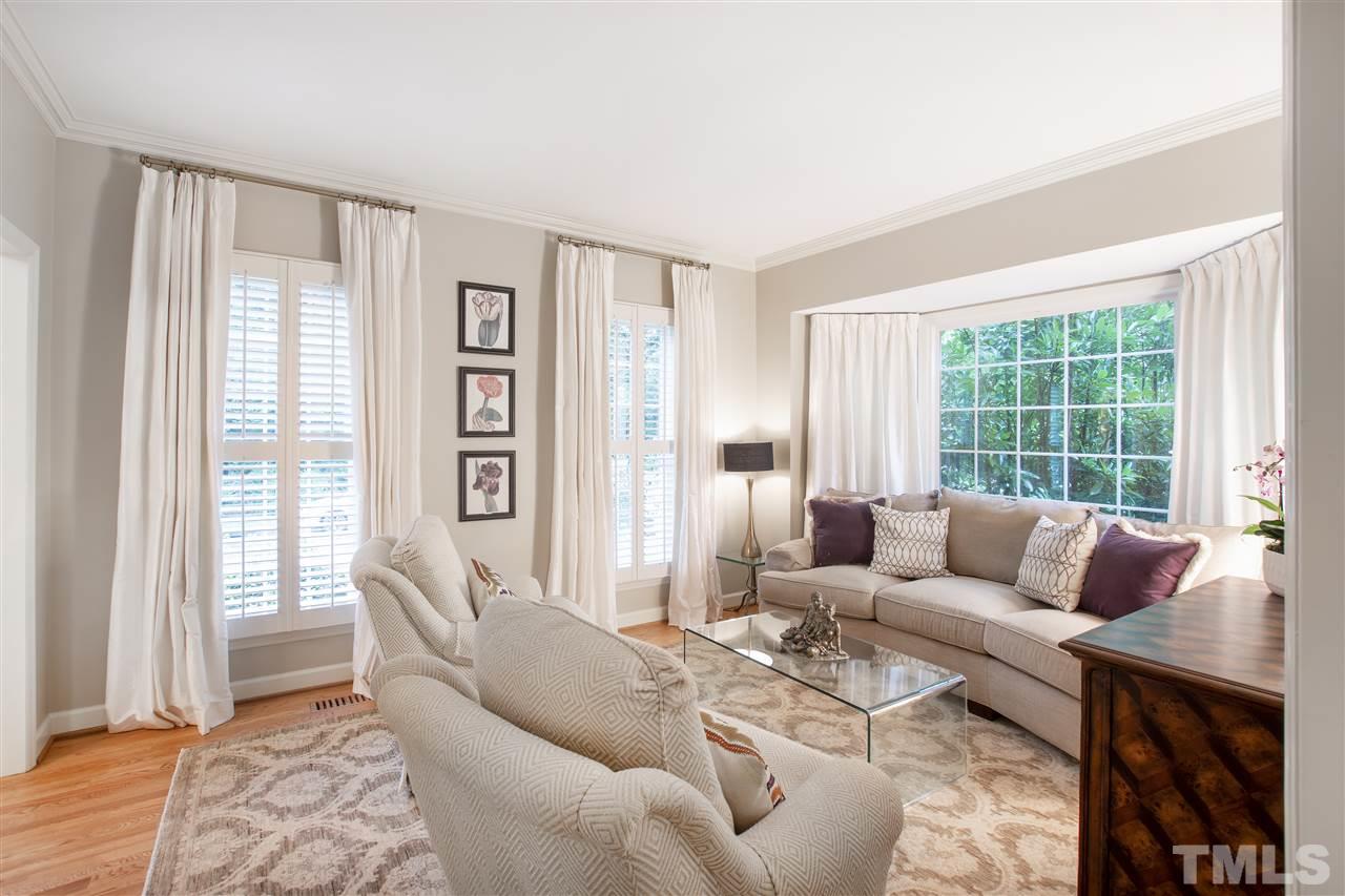 2324 Oxford Road Raleigh, NC 27608 - Photo 3 of 30 a living room with furniture and a large window