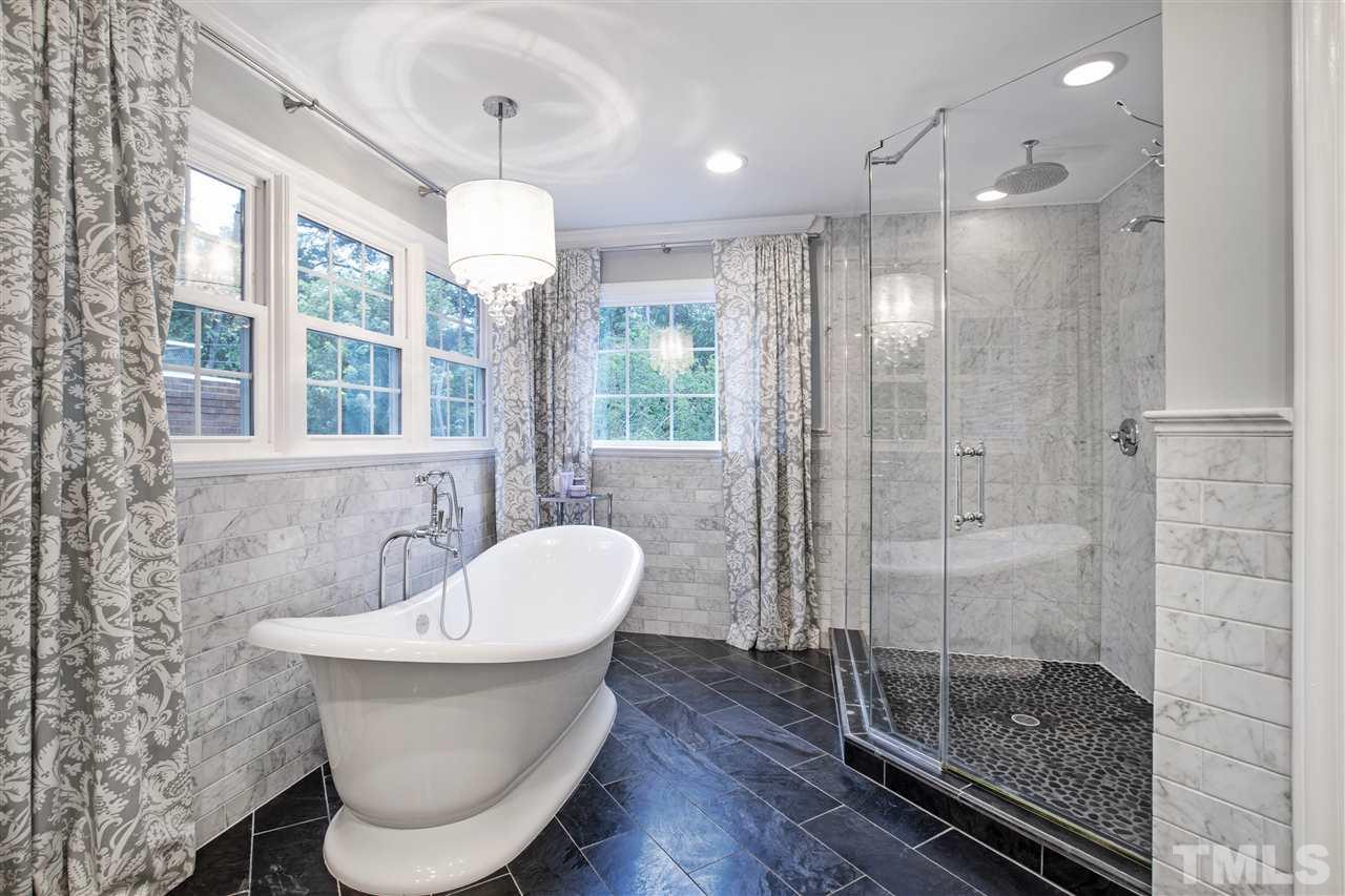 2324 Oxford Road Raleigh, NC 27608 - Photo 22 of 30 a bathroom with a sink and a mirror