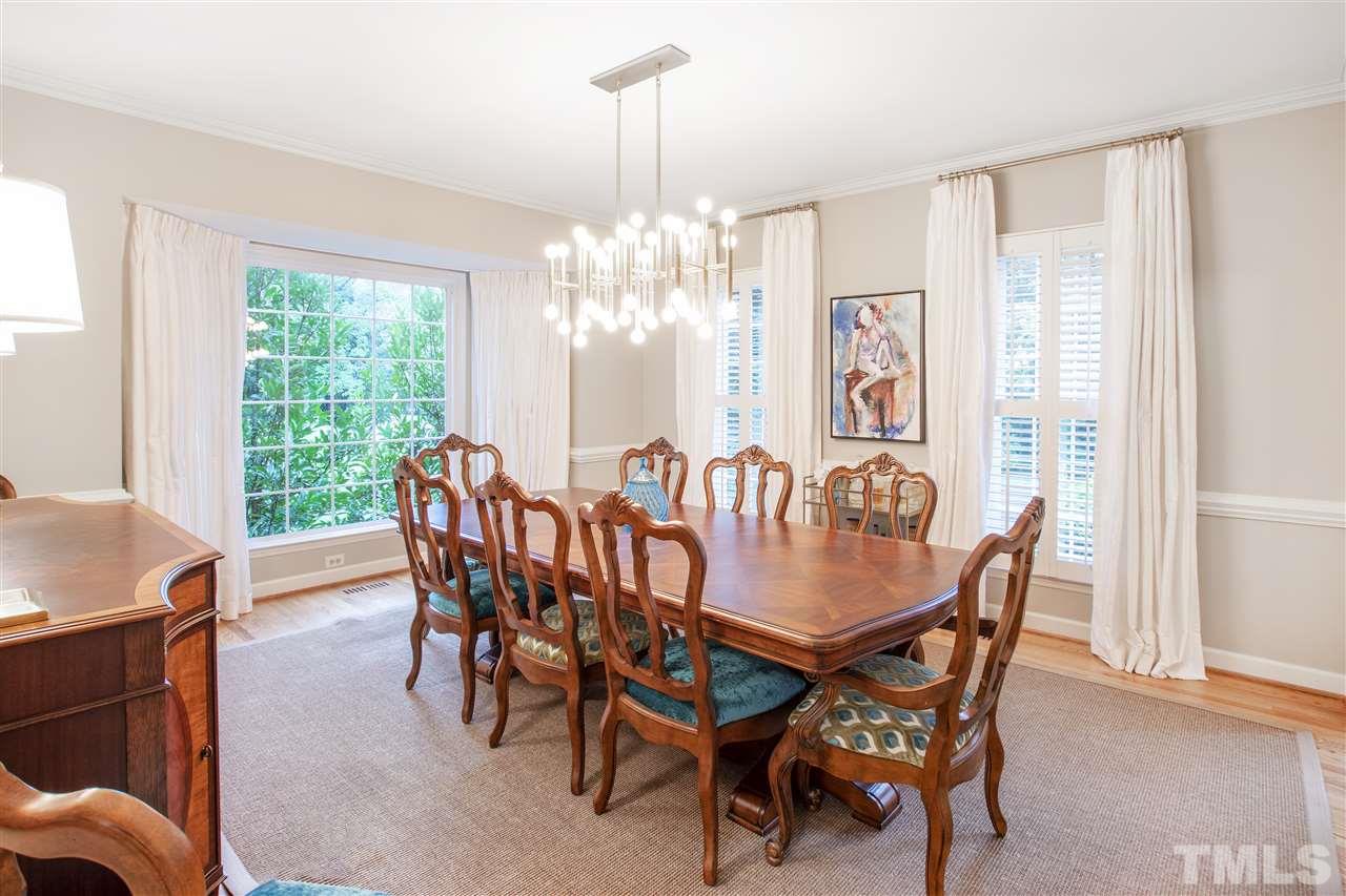 2324 Oxford Road Raleigh, NC 27608 - Photo 4 of 30 a view of a dining room with furniture window and outside view