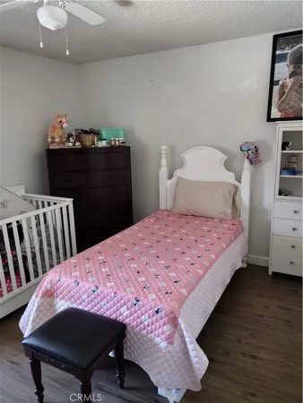 a bed room with a bed and a window