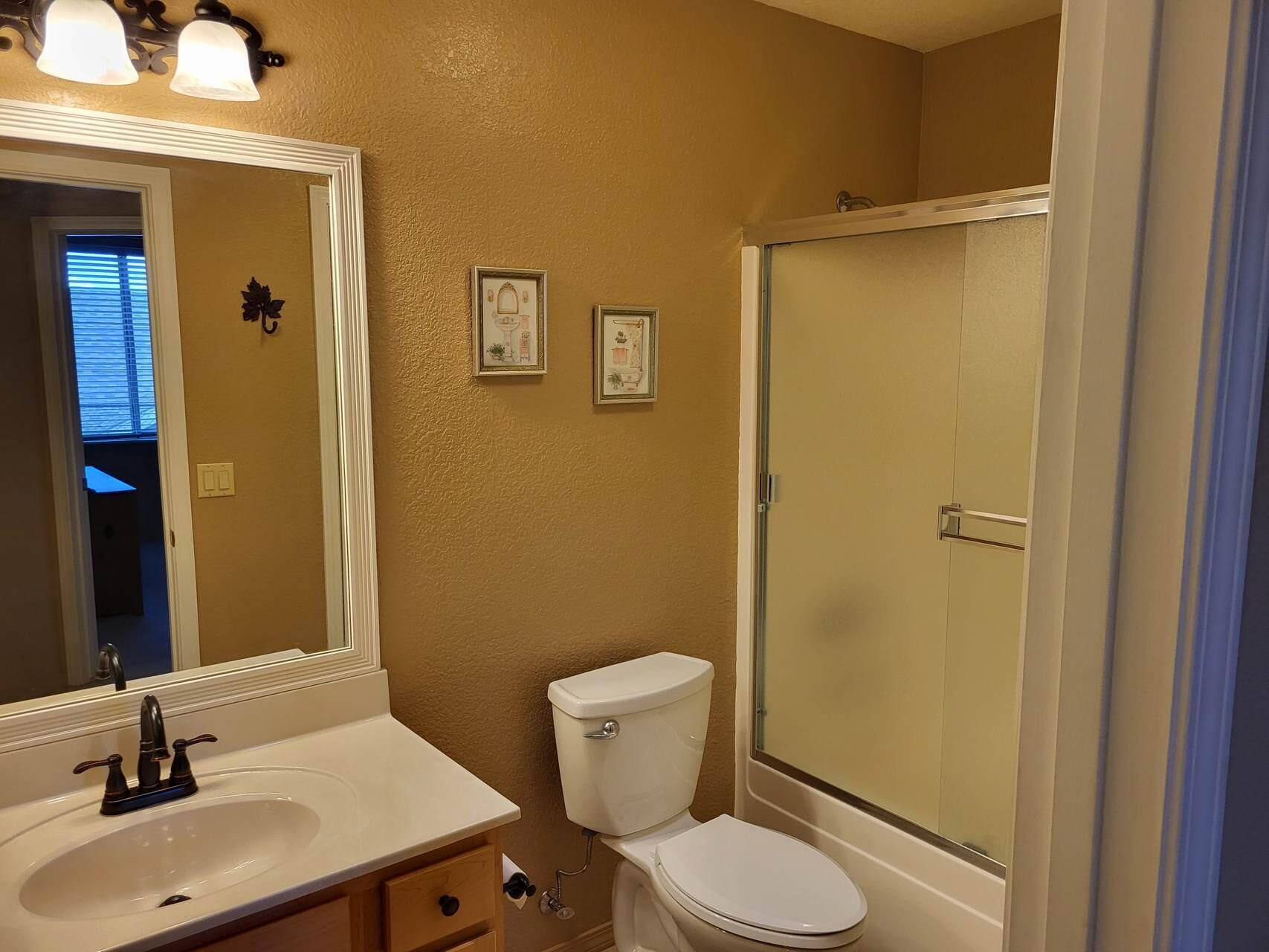 1120 South Sycamore Circle Payson, AZ 85541 - Photo 25 of 44 a bathroom with a sink a toilet and shower