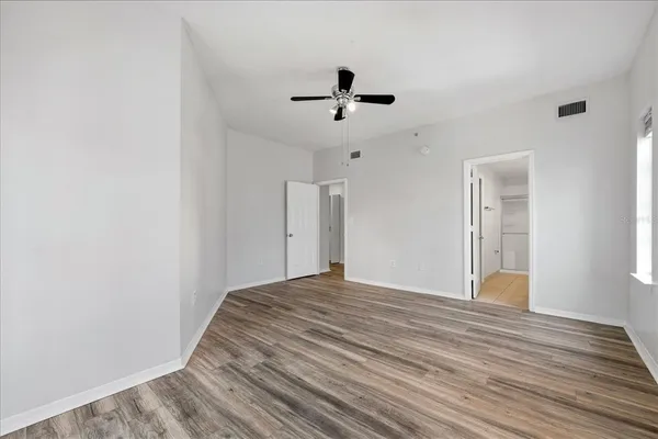 a view of a balcony with wooden floor