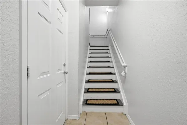 a view of entryway with stairs