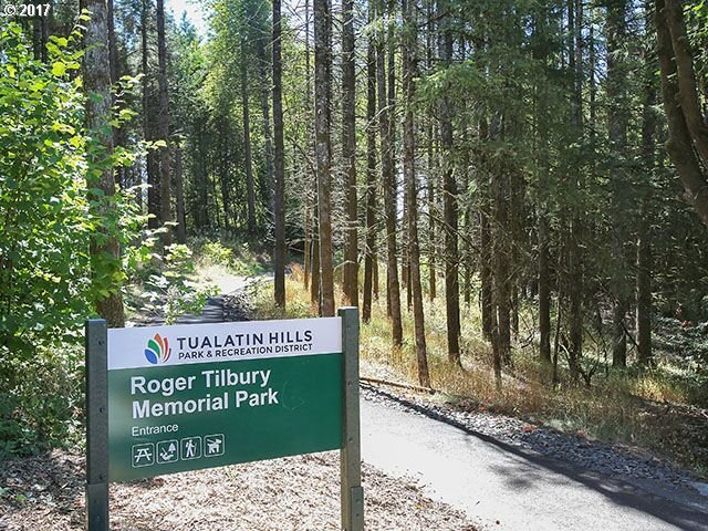 9478 Northwest Ember Lane Portland, OR 97229 - Photo 20 of 23 a sign on the side of a road