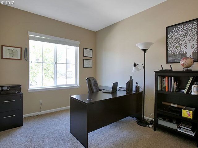 9478 Northwest Ember Lane Portland, OR 97229 - Photo 9 of 23 a work room with furniture and a window