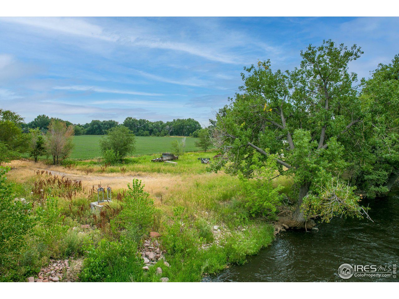 4801 East Harmony Road Fort Collins, CO 80528 - Photo 14 of 27 a view of a lush green field