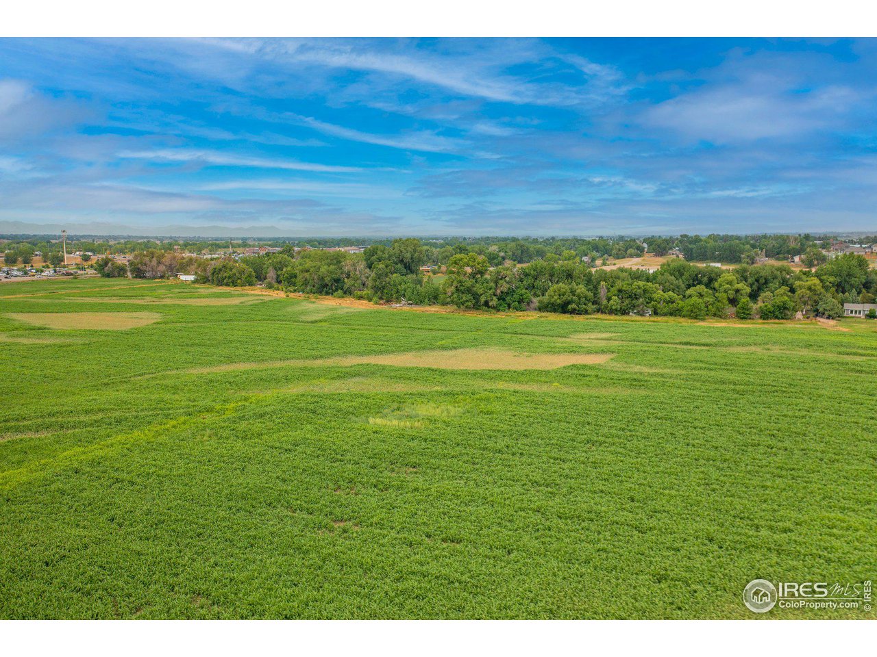 4801 East Harmony Road Fort Collins, CO 80528 - Photo 21 of 27 a view of a big yard with an outdoor space