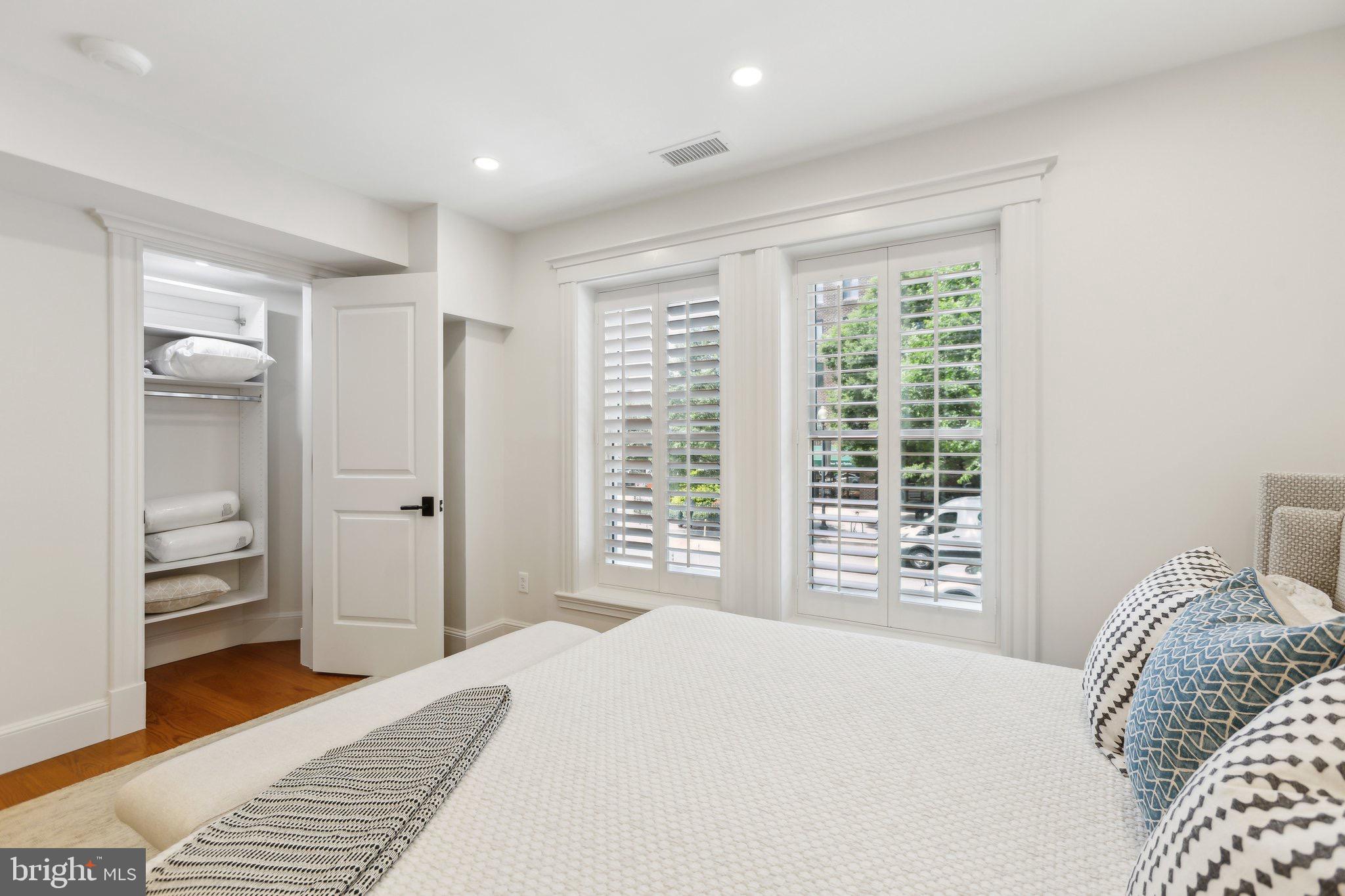 1641 R Street Northwest, Unit 301 Washington, DC 20009 - Photo 21 of 36 Bright and airy bedroom with stylish windows.