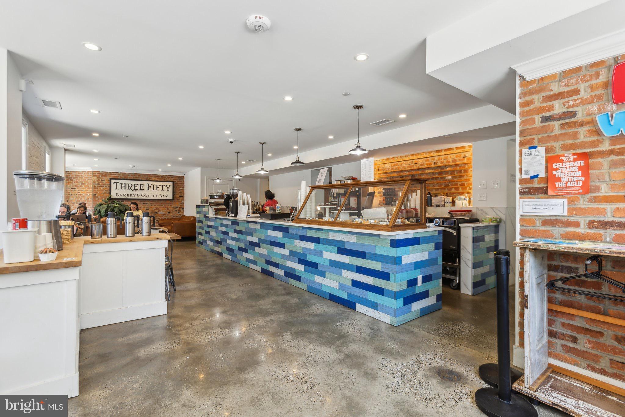 1641 R Street Northwest, Unit 301 Washington, DC 20009 - Photo 30 of 36 Vibrant cafe with a modern coastal vibe.