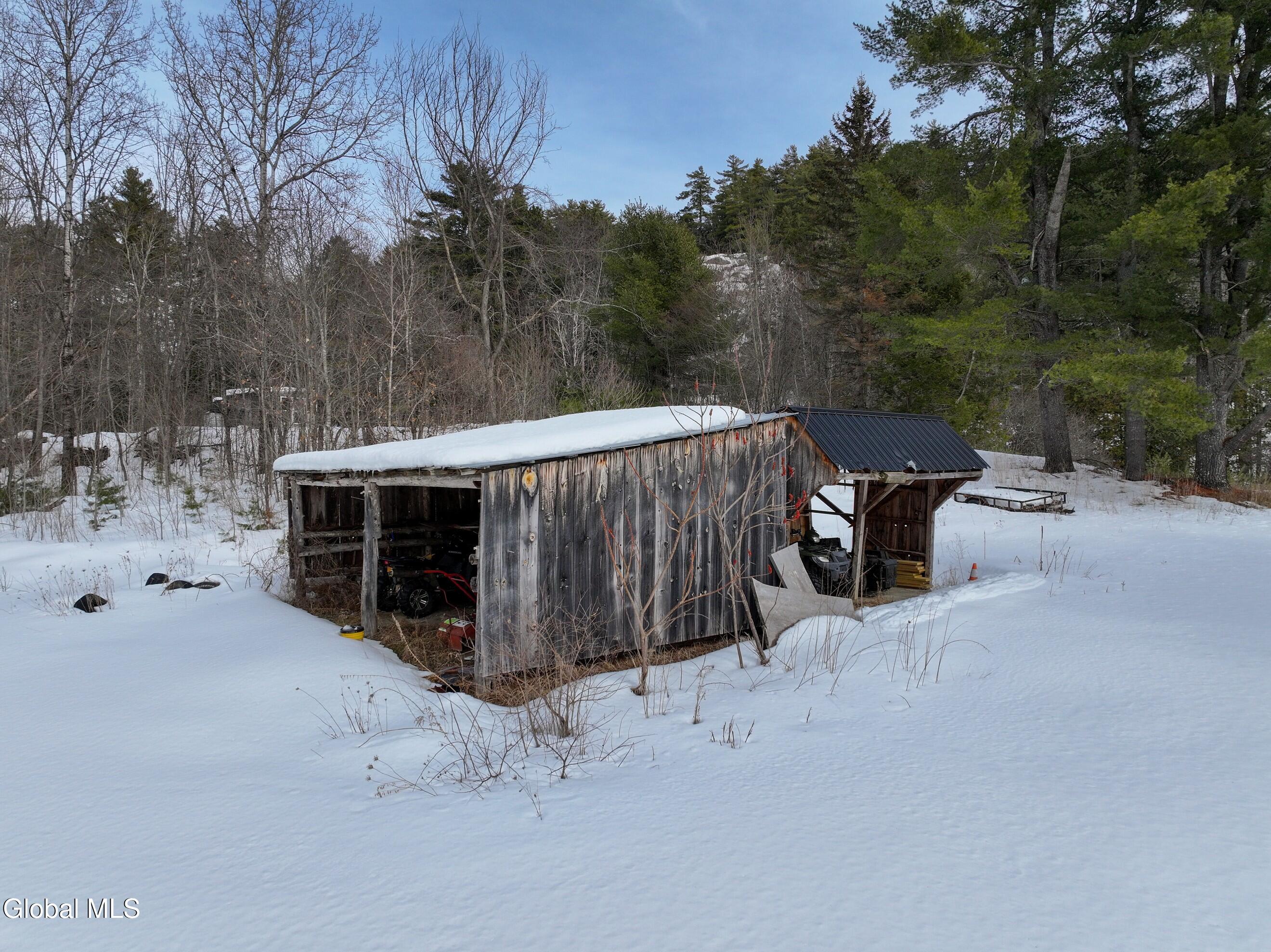 225 Fairy Lake Road Moriah, NY 12960 - Photo 49 of 67 woodshed