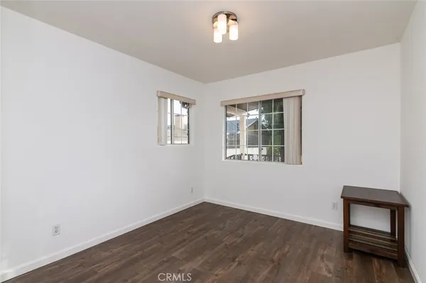 a room with window and a wooden floor