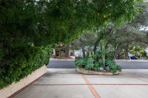 a view of a garden with patio