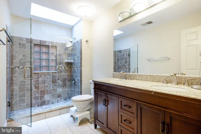 a bathroom with a sink and a toilet