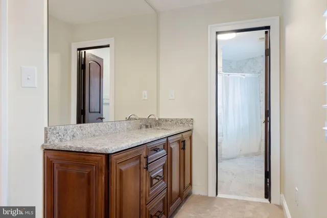 a bathroom with a shower and toilet