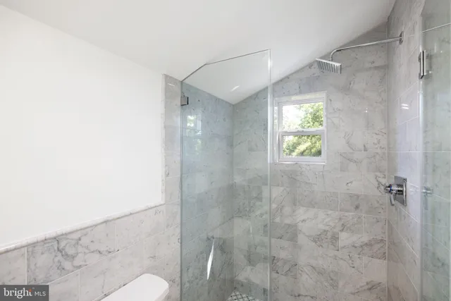 a bathroom with a sink toilet and vanity