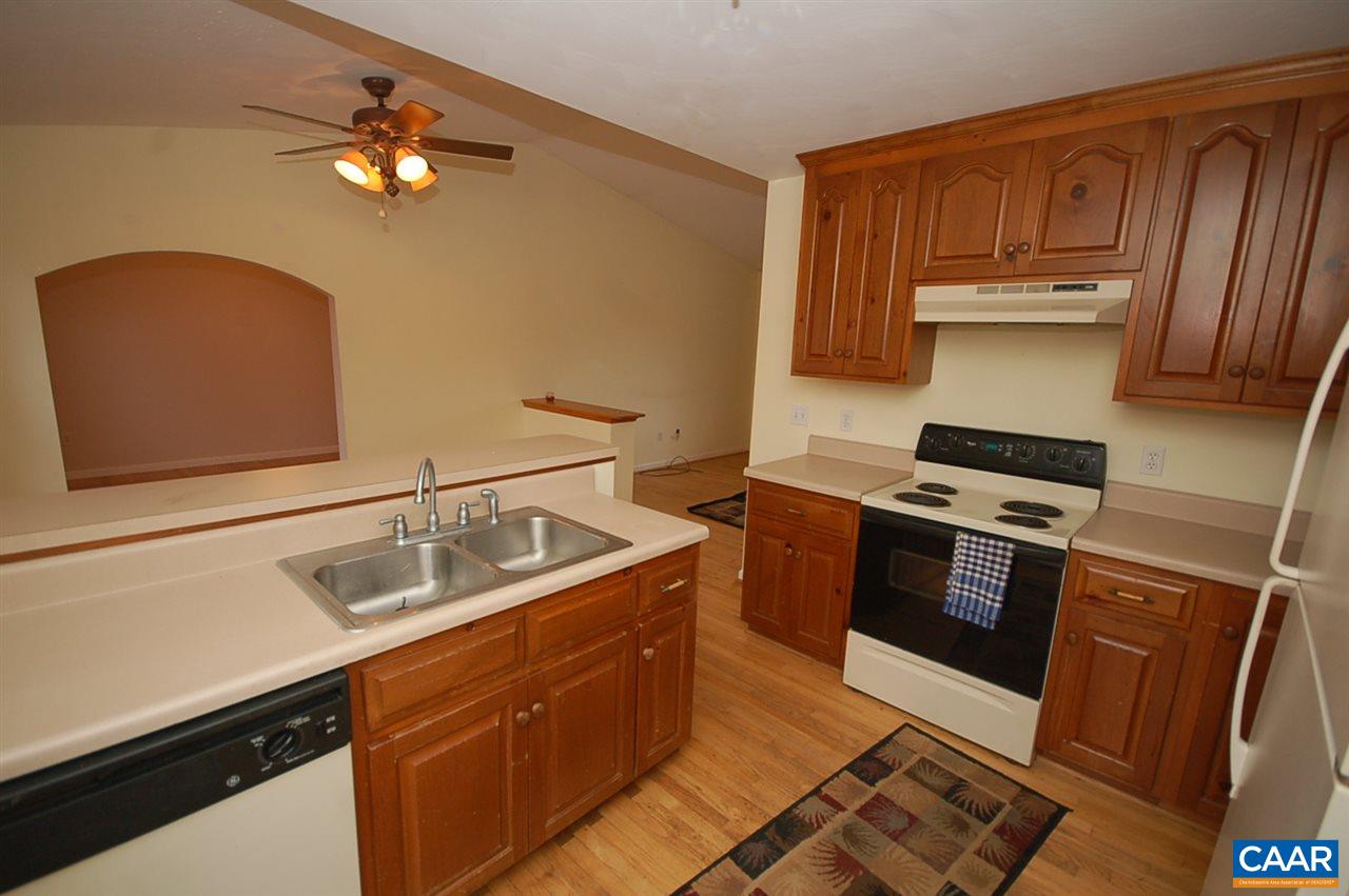 5075 Celt Road Stanardsville, VA 22973 - Photo 16 of 36 a kitchen with a sink stove and microwave
