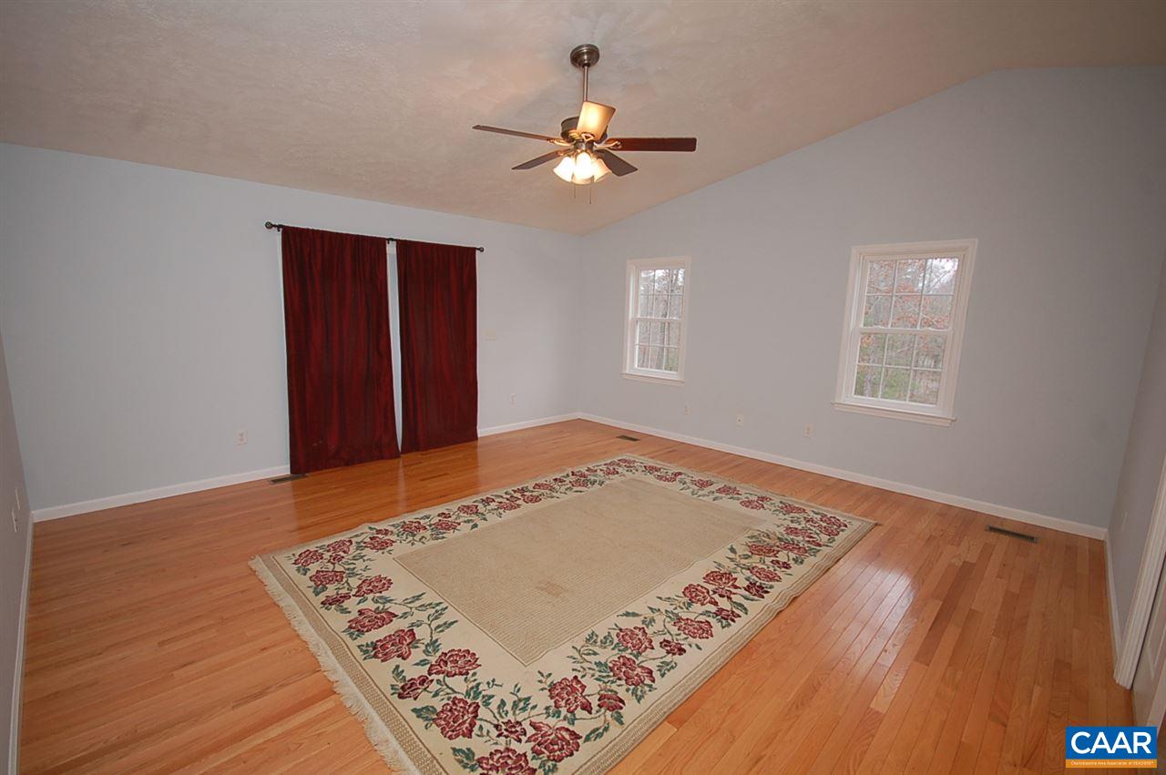 5075 Celt Road Stanardsville, VA 22973 - Photo 28 of 36 a view of an empty room with window and wooden floor