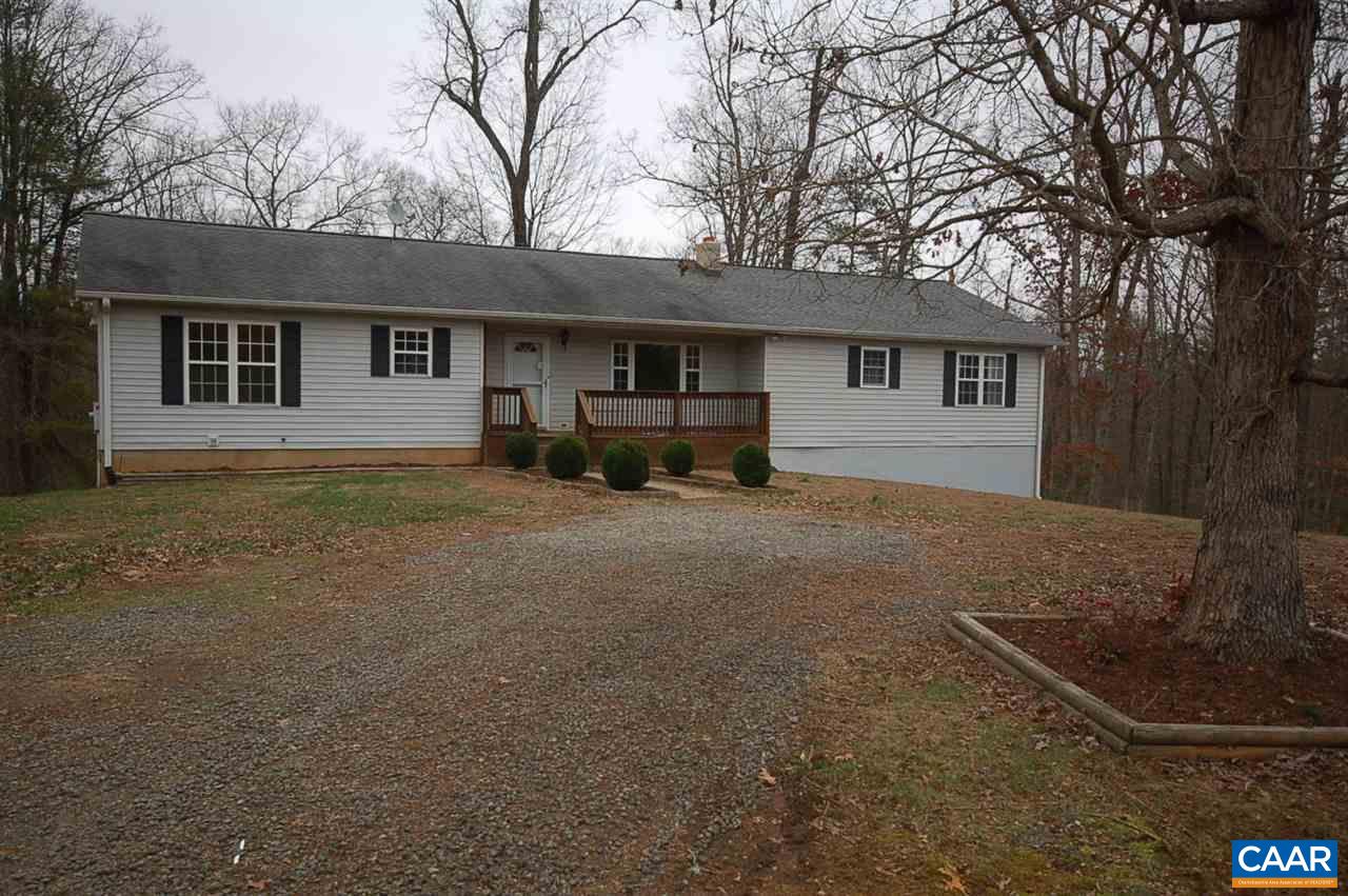 5075 Celt Road Stanardsville, VA 22973 - Photo 3 of 36 a house that has a tree in front of it