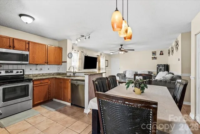 a kitchen that has a cabinets counter space and a sink