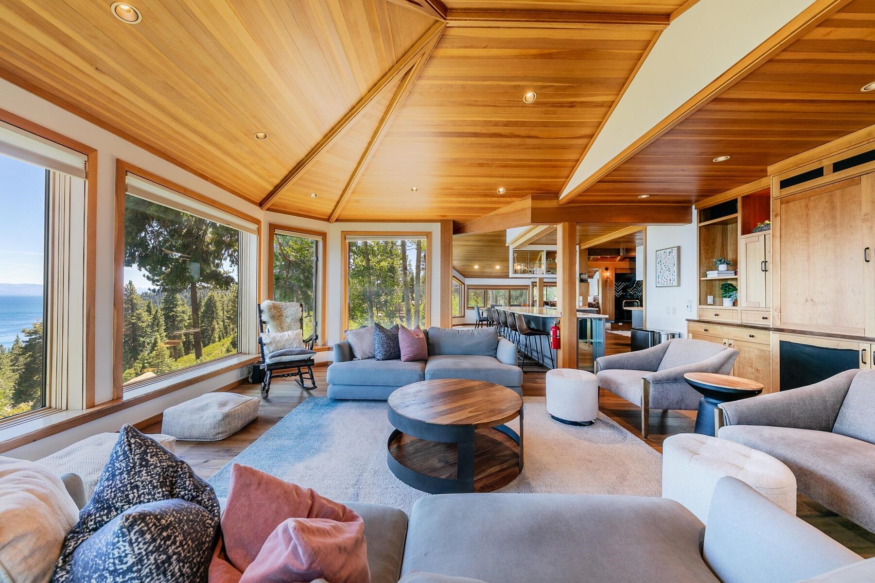 488 Old County Road Carnelian Bay, CA 96140 - Photo 11 of 21 a living room with furniture and a large window