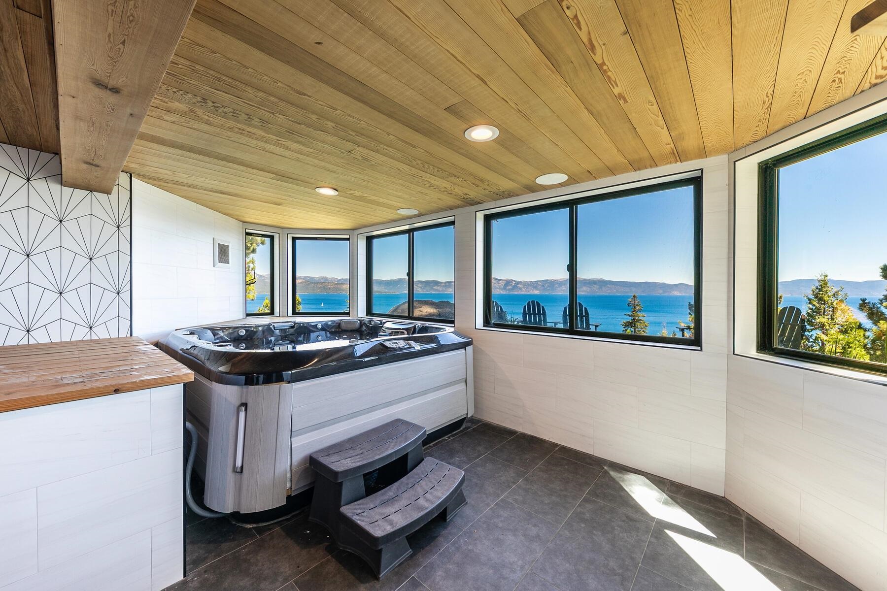 488 Old County Road Carnelian Bay, CA 96140 - Photo 14 of 21 a kitchen with stainless steel appliances granite countertop a stove and a refrigerator