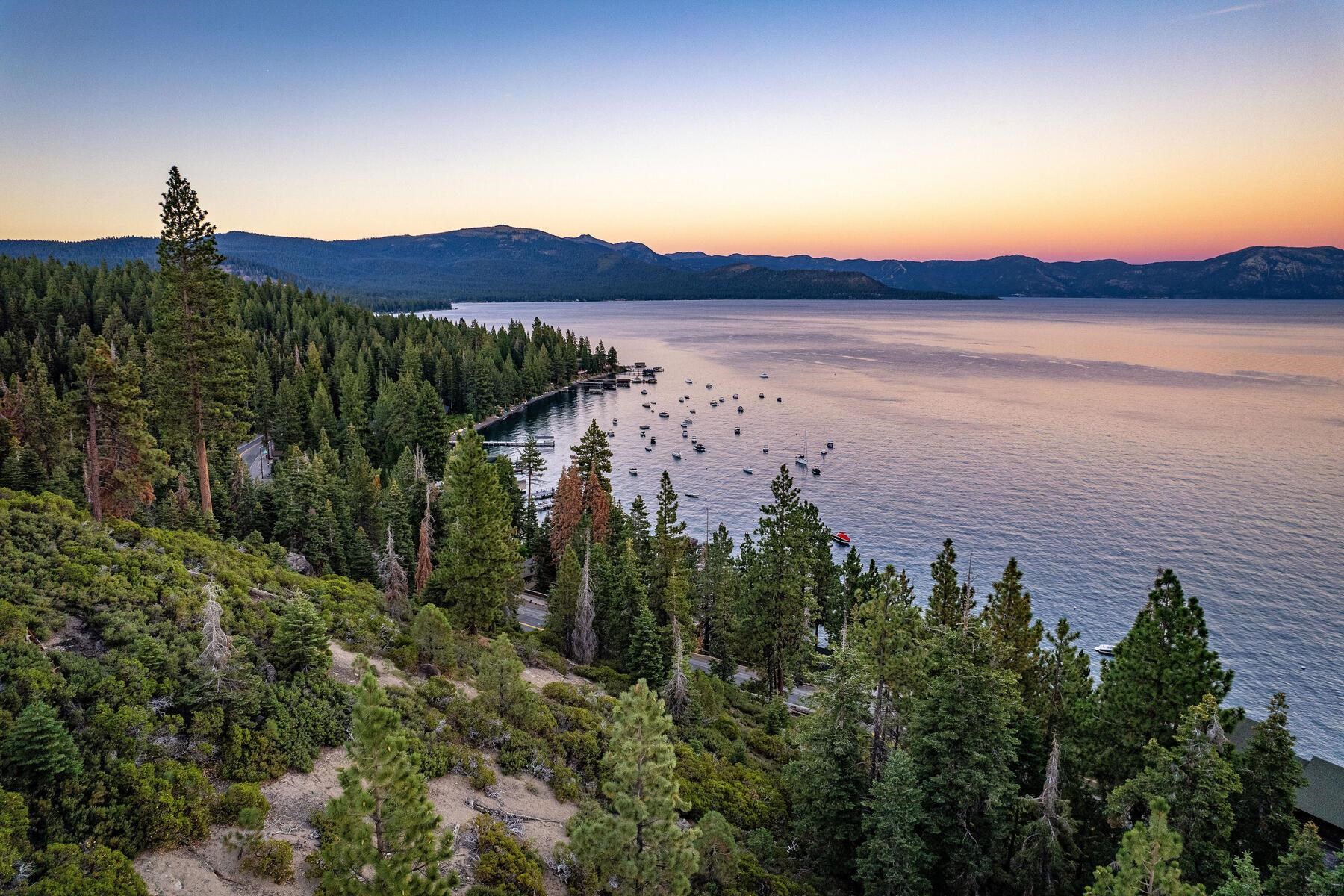 488 Old County Road Carnelian Bay, CA 96140 - Photo 3 of 21 a view of a lake with a mountain in the background