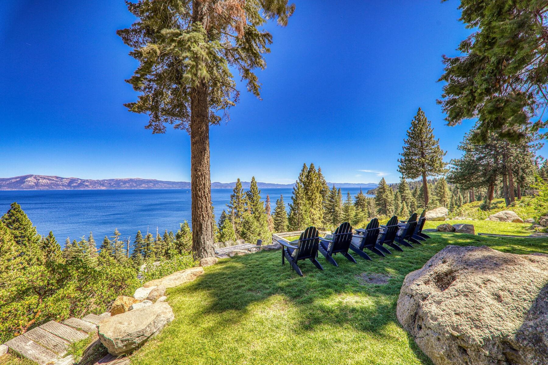 488 Old County Road Carnelian Bay, CA 96140 - Photo 6 of 21 a view of a garden with a building in the background