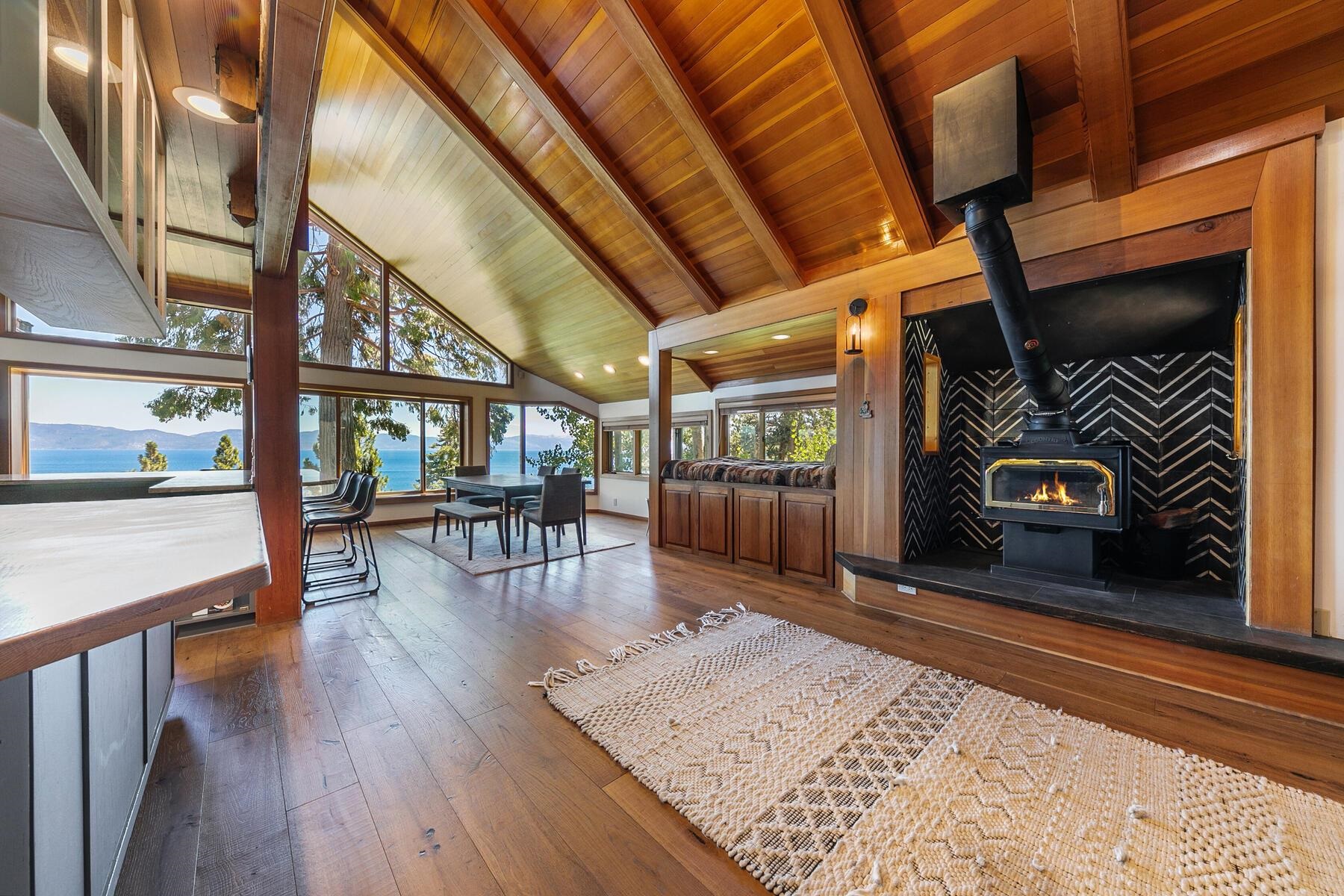 488 Old County Road Carnelian Bay, CA 96140 - Photo 7 of 21 a living room with furniture and a fireplace