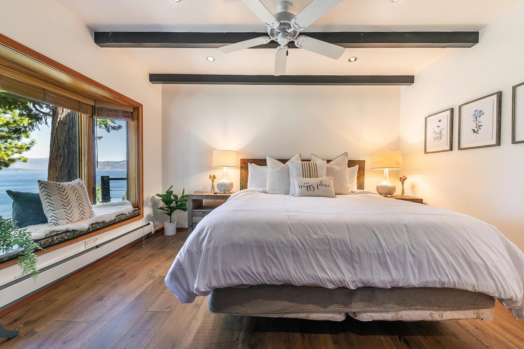 488 Old County Road Carnelian Bay, CA 96140 - Photo 9 of 21 a bedroom with a bed and window