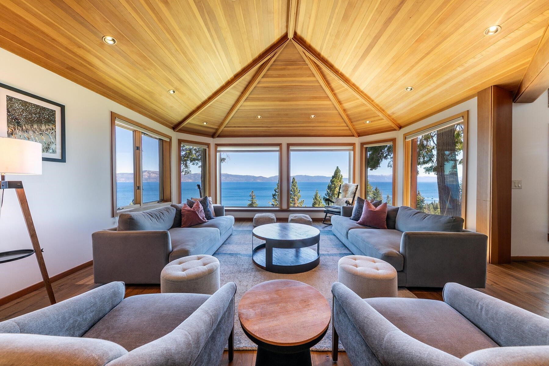 488 Old County Road Carnelian Bay, CA 96140 - Photo 10 of 21 a living room with furniture and a large window