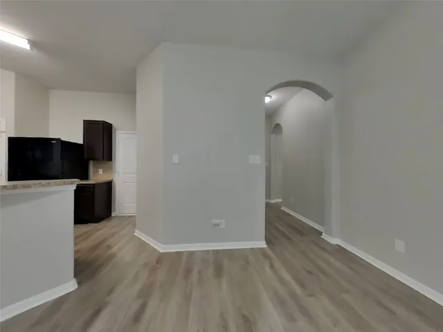 a view of a livingroom with wooden floor
