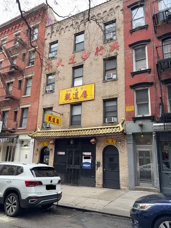 a car parked in front of a building