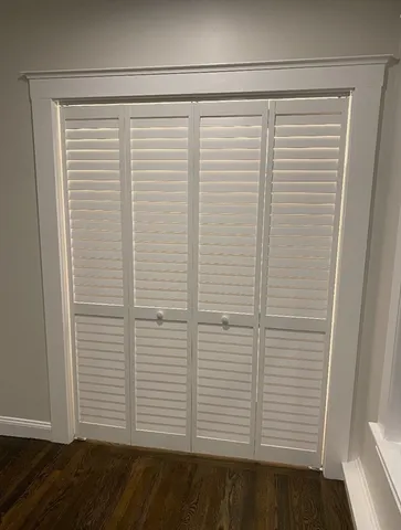 a view of a room that has a window