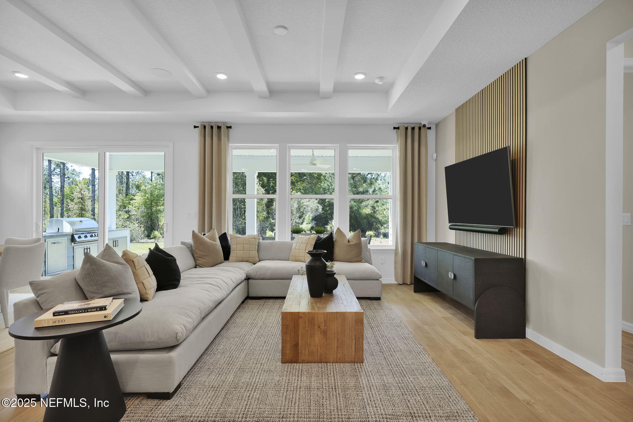 124 Headstream Drive St. Johns, FL 32259 - Photo 10 of 22 a living room with furniture and a flat screen tv