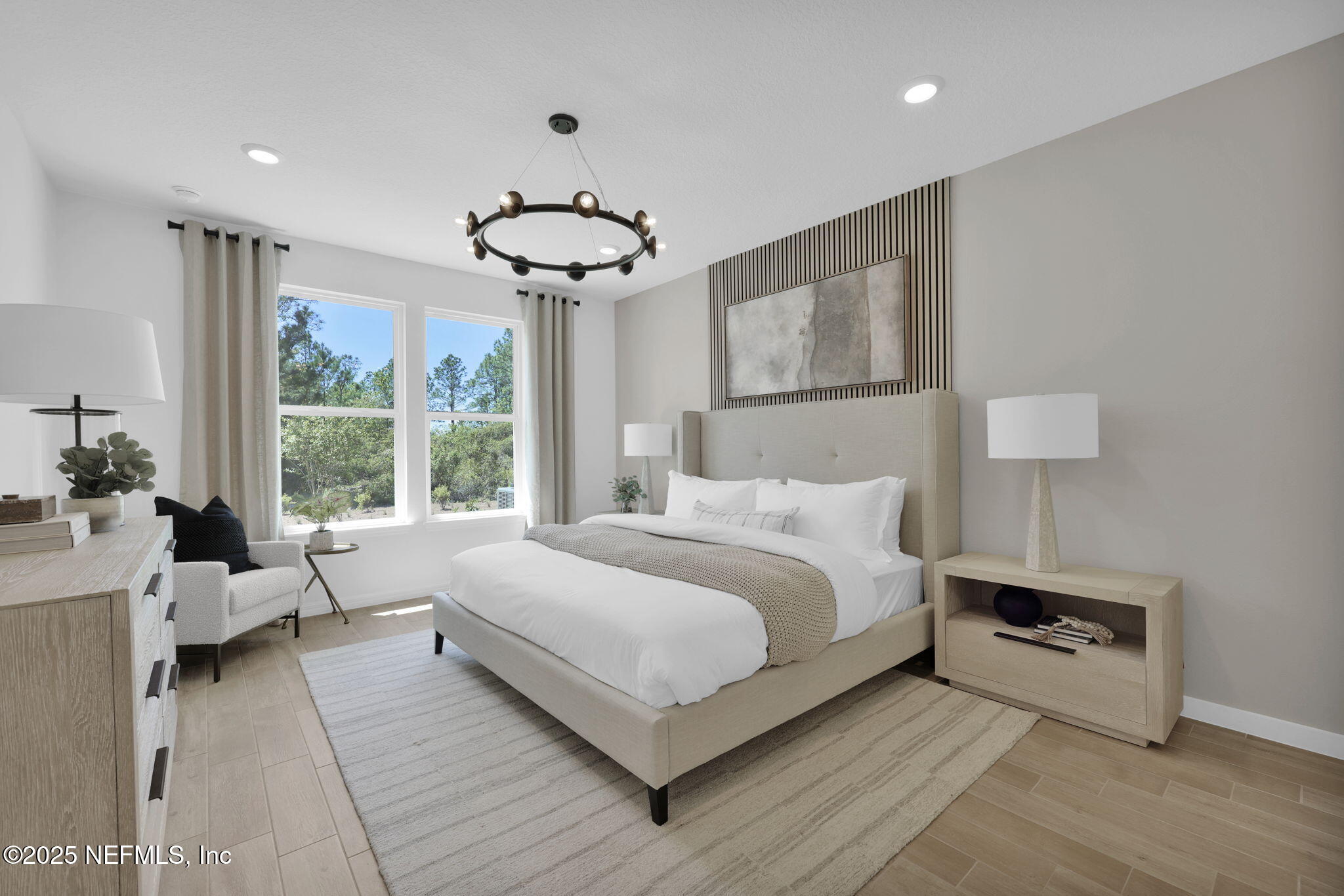 124 Headstream Drive St. Johns, FL 32259 - Photo 11 of 22 a bedroom with a large bed and a window