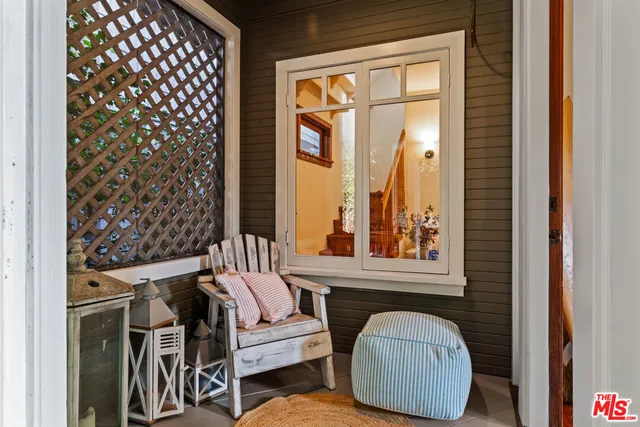 a view of front door with furniture
