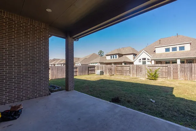 a view of a backyard with a tub