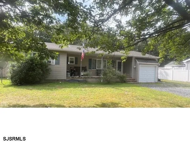 a view of a house with a swimming pool