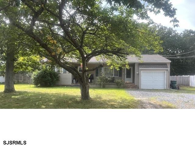 61 Leitz Boulevard Tuckerton, NJ 08087 - Photo 2 of 24 a sink and a yard with a big trees